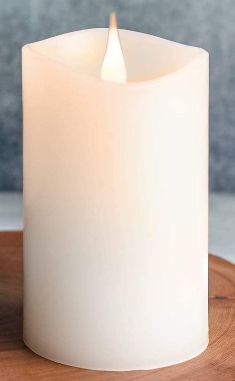 Battery operated remote candle pillar